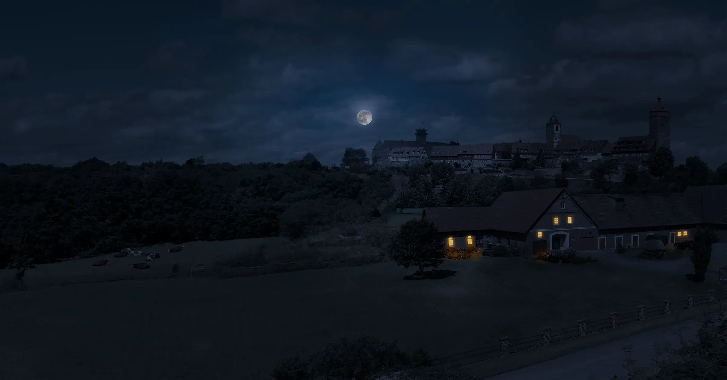 Landwirtschaftlicher Betrieb mit bestehender Stromversorgung, während das Dorf dunkel ist